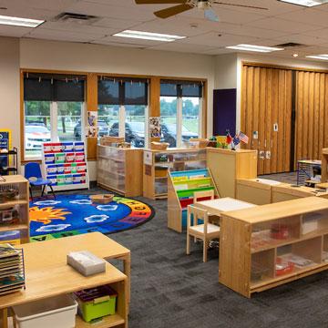 Pre-Kindergarten Classroom, showing different learning areas including puzzle, circle time, and dramatic play.